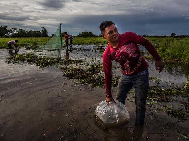 man working on orinoco river