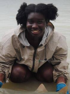 Jasmin Holding a sawfish