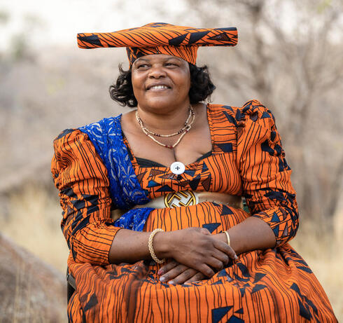 A woman in colorful traditional clothing