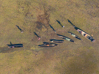 Aerial photo of fisher boats on shore