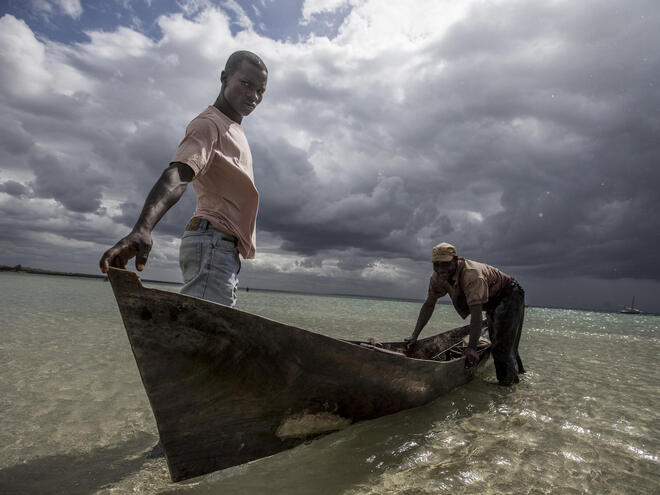 Fisherman in their boats, Ilha de Mafamede, Mozambique.