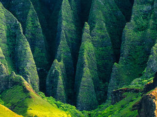 View of the Na Pali Coast from the ocean in Kauai.