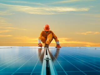 A man working at solar power station